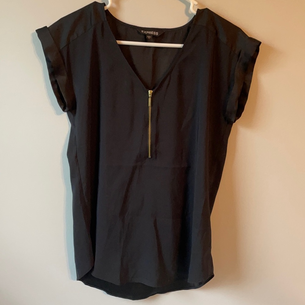 Black work top with gold 1/4 zip.